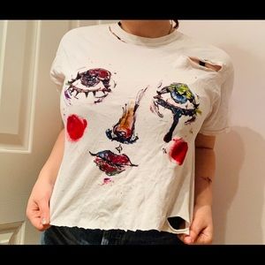 “trash face” distressed andhand painted crop shirt